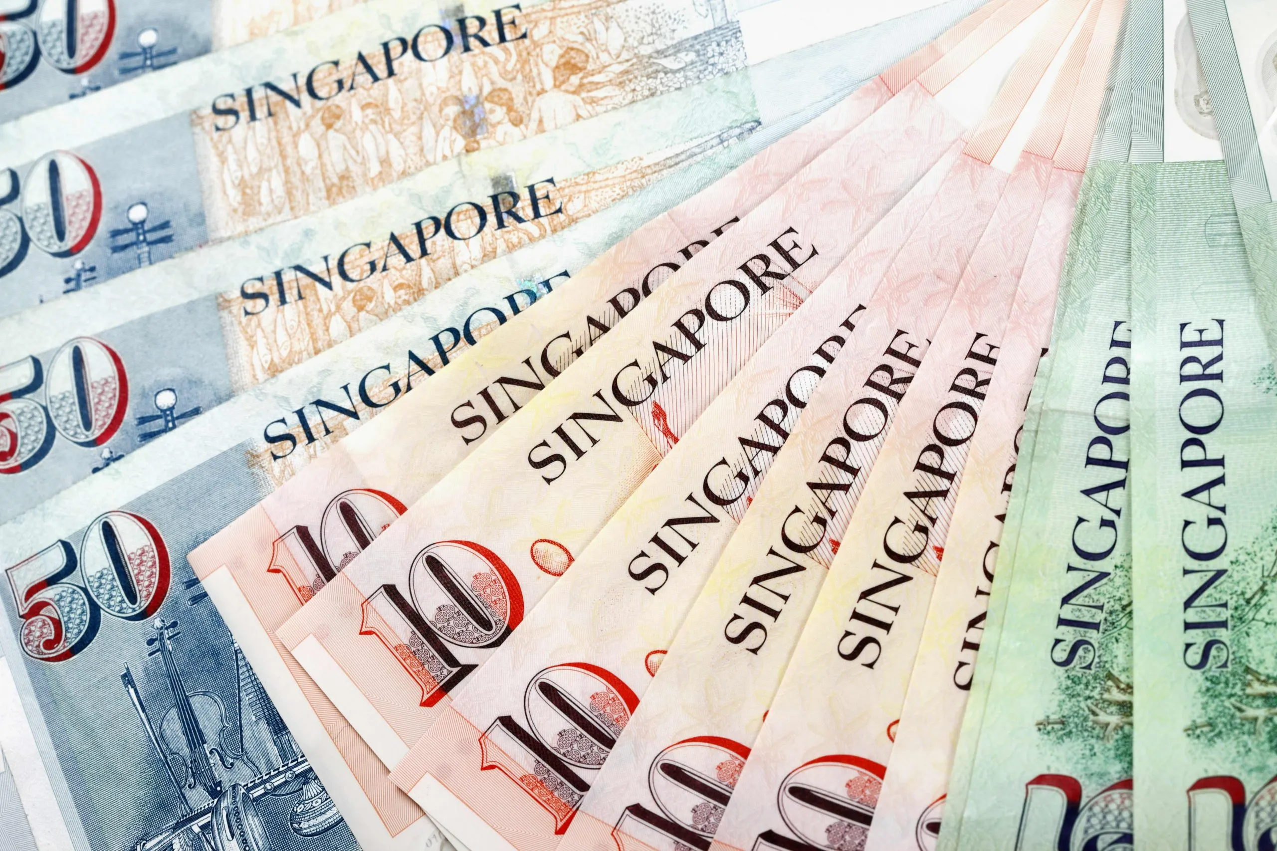Nên đổi tiền trước khi du lịch Singapore